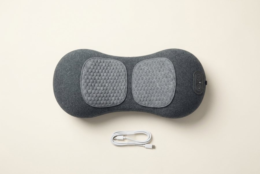 One Lumbean Back Decompression Massager with its USB-C cable.